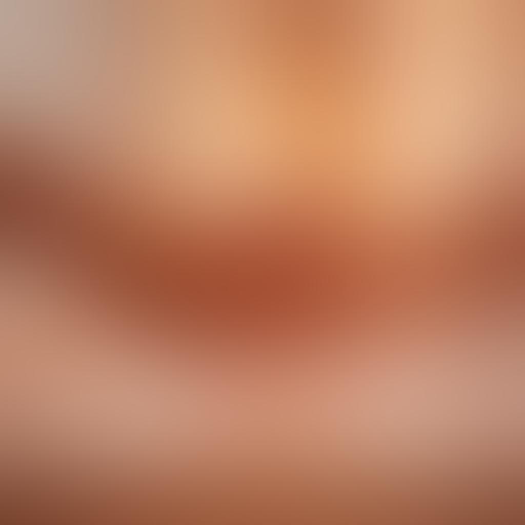 A serene scene depicting diverse couples sharing intimate moments in various cozy settings, surrounded by soft lighting and warm colors. Symbols of connection like heart shapes and entwined hands subtly incorporated in the background. An inviting atmosphere that reflects pleasure and authenticity in adult relationships. ethereal style. soft pastel colors. blurred background.